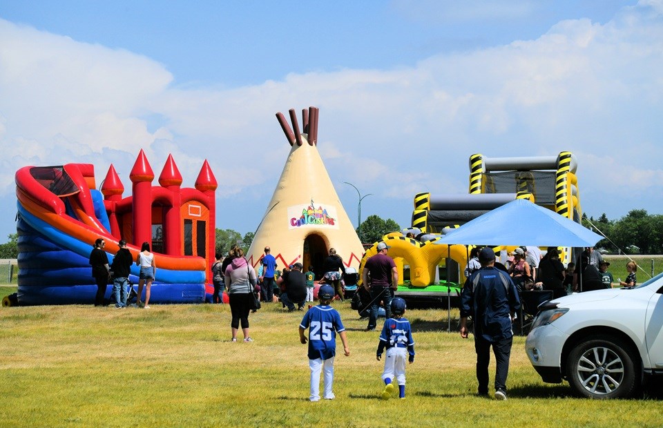 Wilkie Regional Park was transformed for Jump Into Summer with huge inflatables where kids could, quite literally, jump into summer.