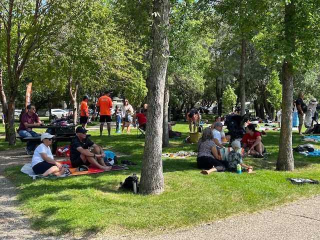 families-and-onlookers-at-slip-and-slide