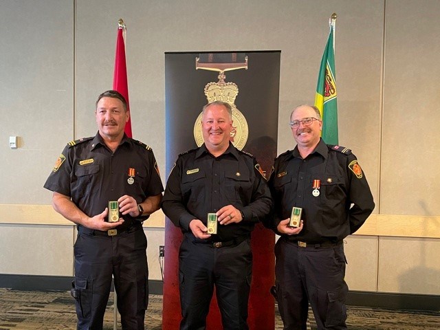 Peter Sieben, Justin Bast and Rod Soderlund were all recipients of the province's 25 year protective services medal in 2021.