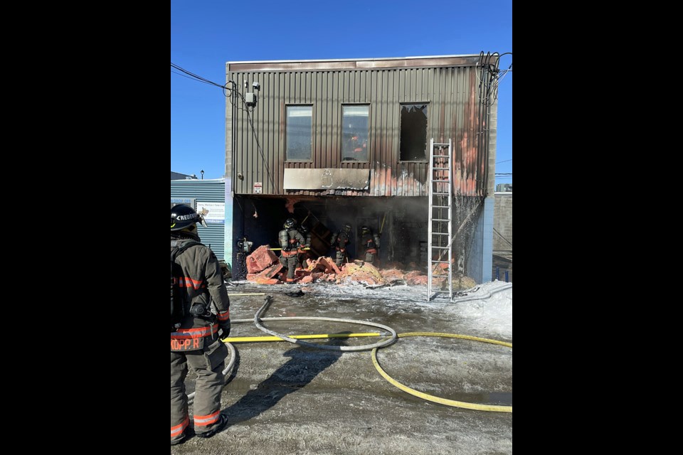 Saskatoon fire crews inspect the rest of the structure.