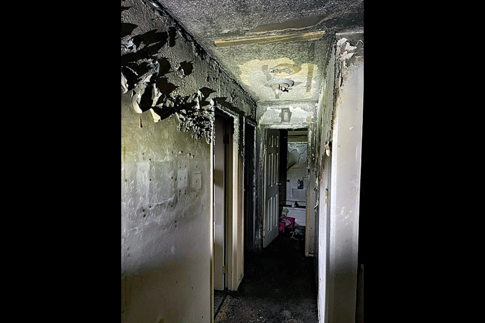 The burnt remains of the hallway on the ground floor of a condominium in Kingsmere Boulevard.