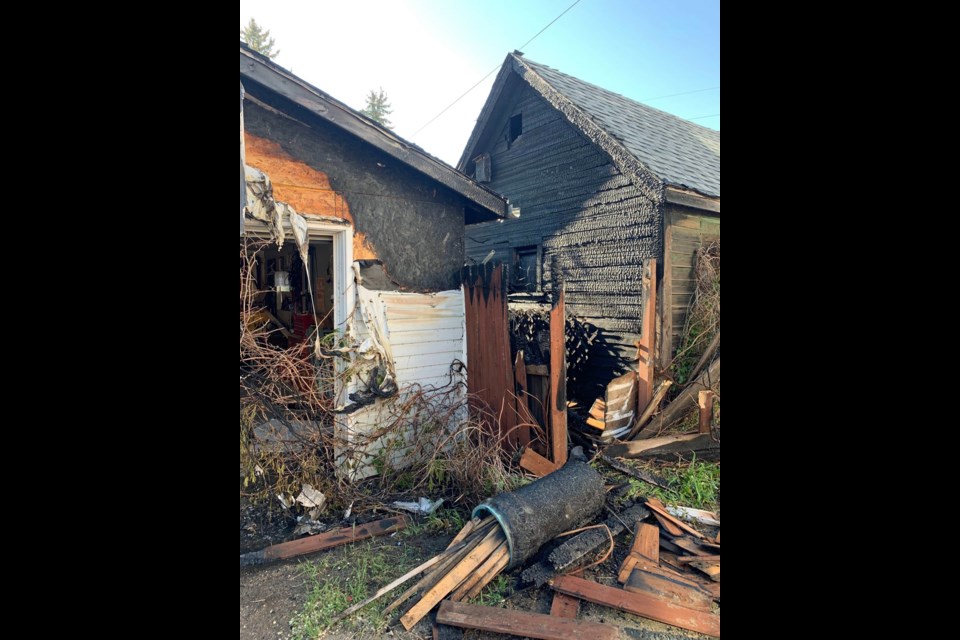 What remains of the garage on Avenue E South after firefighters extinguished a fire early Friday morning.