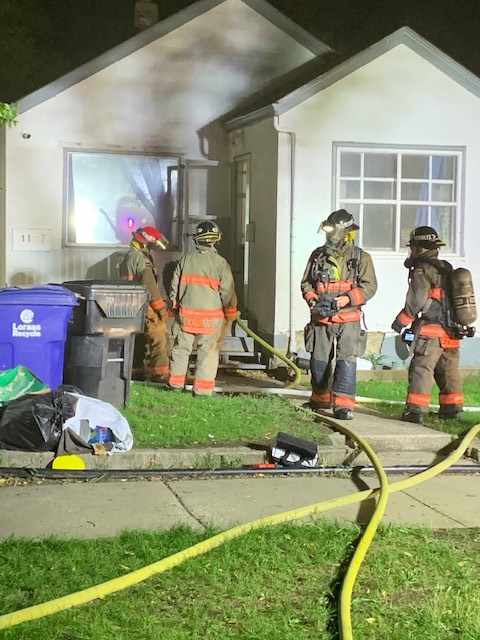 Fire crews check the structure to see if the fire at the 1100 block of Avenue G 鶹Ƶ is controlled.