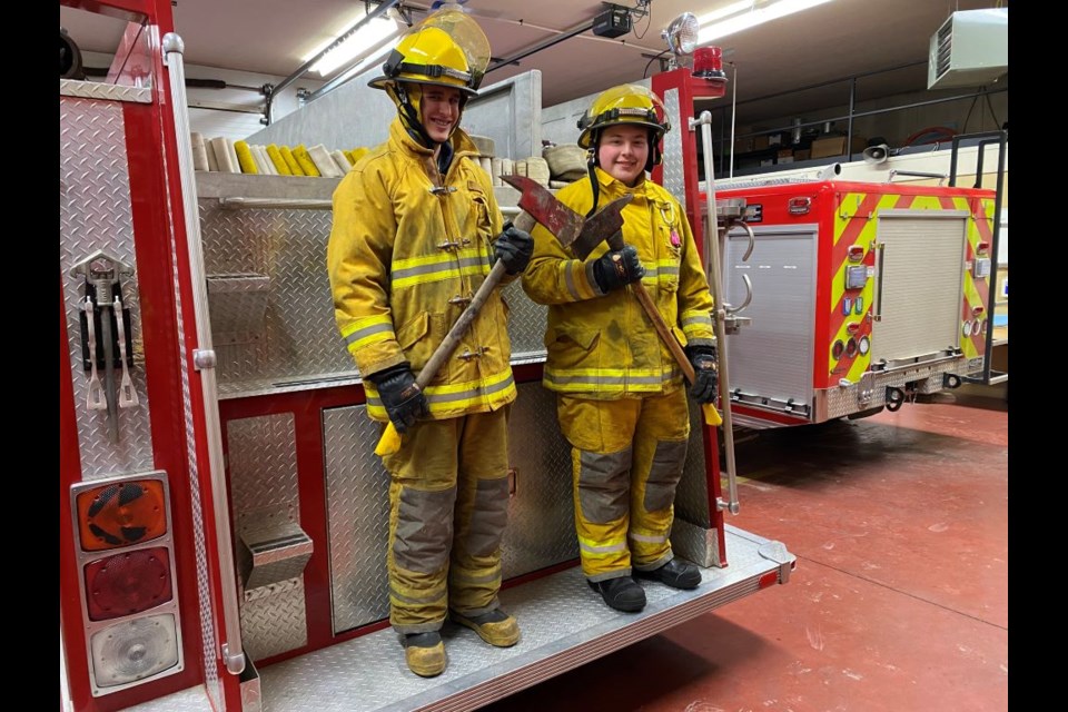 Jacob Stewart and Hunter Sittler, student fire fighters for the Wilkie department.