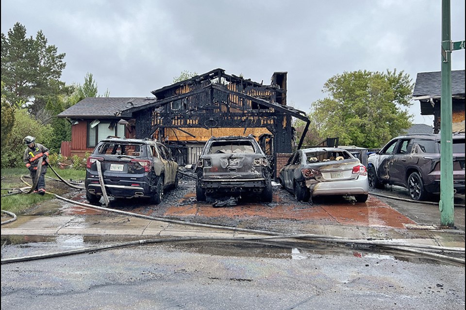 The Saskatoon Fire Department says that at 7:30 a.m., they received a report of a house on fire in the 400 block of Nesbitt Way. 