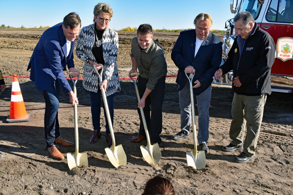 Saskatoon Mayor Charlie Clark, from left, Corman Park Councillor Wendy Trask, Martensville Deputy Mayor Tyson Chillog and Warman Mayor Gary Philipchuck prepare the ceremonial groundbreaking for the facility on Wednesday, Sept. 21, as Elder Gilbert Kewistep looks on.