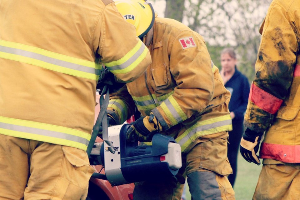 A 2018 file photo shows a closeup of Unity Fire Department members using extrication equipment during a mock accident.