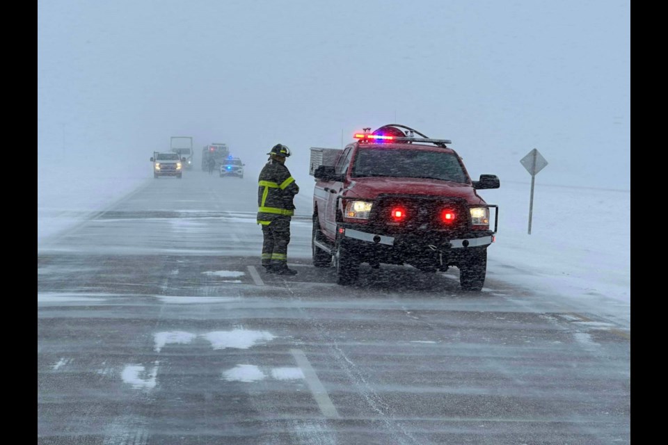 Emergency crews controlled traffic while working a collision scene east of Whitewood.