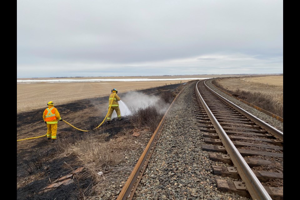 WFD in action, extinguishing a grass fire.