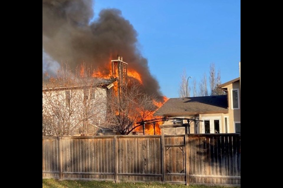 The fire started at a two-storey house in the 100 block of Zeman Crescent. Minutes later the house next door caught fire.