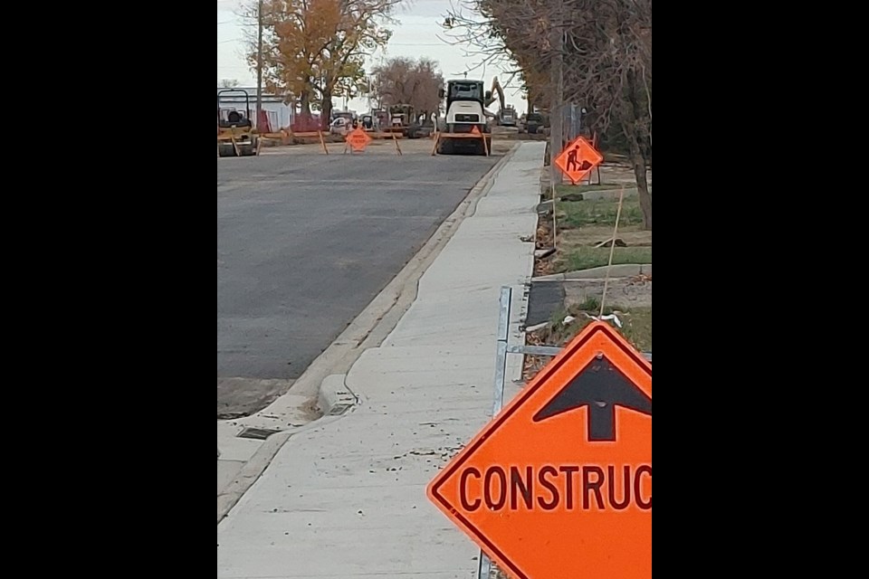 Workers have the west entrance of Unity barricaded as they finish work on the summer-long job on First Avenue.