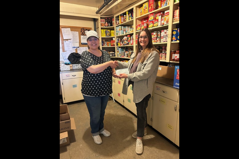 Kelsey Unger (right), the new Canora Public Health Nurse, donated $1,000 to Filling the Gap Foodbank in Canora on April 23 on behalf of the local SUN (Saskatchewan Union of Nurses), union 285. Accepting the donation was Mavis Watson, volunteer administrator at Filling the Gap. 