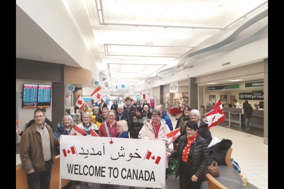 Twenty people representing Bethlehem Lutheran Church (Outlook) and Bethel Lutheran Church (Elbow) were at the airport to greet the refugee families when they arrived.