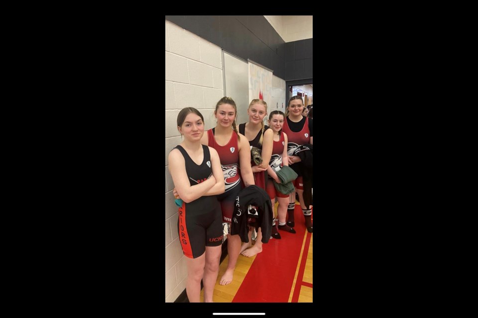 Jade Venn, Kierra Babchuk, Natalee Ironstand, Kylie Weber and Andreea Tatarciuc wait patiently in the halls at Provincials.