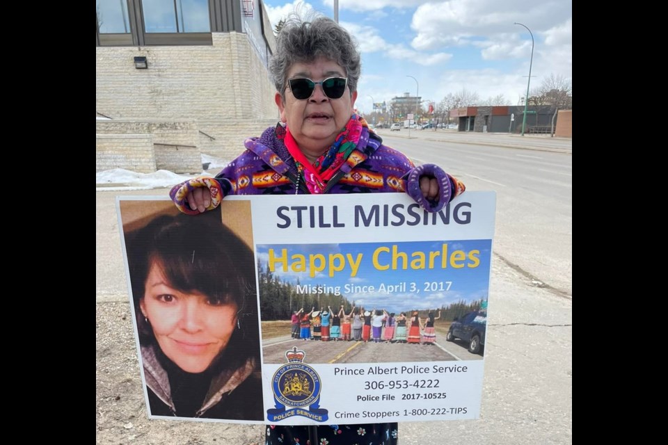 Shown is Regina Poitras, the mother of Happy Charles, at the gathering on April 3, 2025.