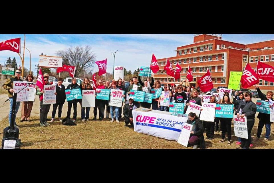 CUPE Local 5430 members from the southeast region gathered for a noon-hour information picket at the Weyburn General Hospital on Tuesday.