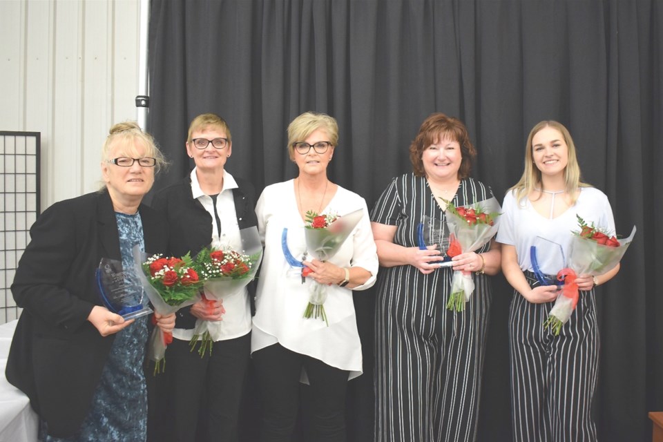 Dr. Allison Christie, left, received a standing ovation as she was walking towards the stage to accept the TS&M Outstanding Contribution to the Workplace Award during the Women of Today ceremony in 2019.