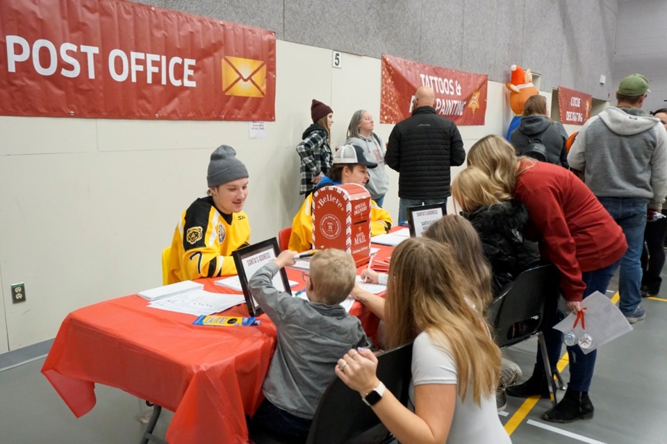 At Santa's Workshop, kids had a chance to make their wishes and send letters to Santa through the Bruins' post office.                               