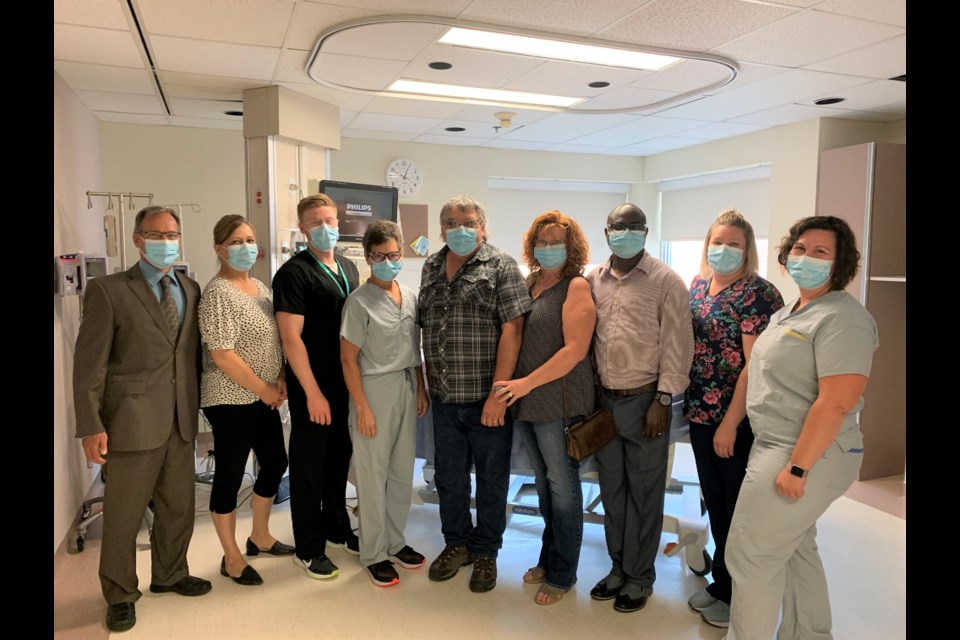  Lorne and Charmaine Dwernychuk with Intensive Care Unit staff.