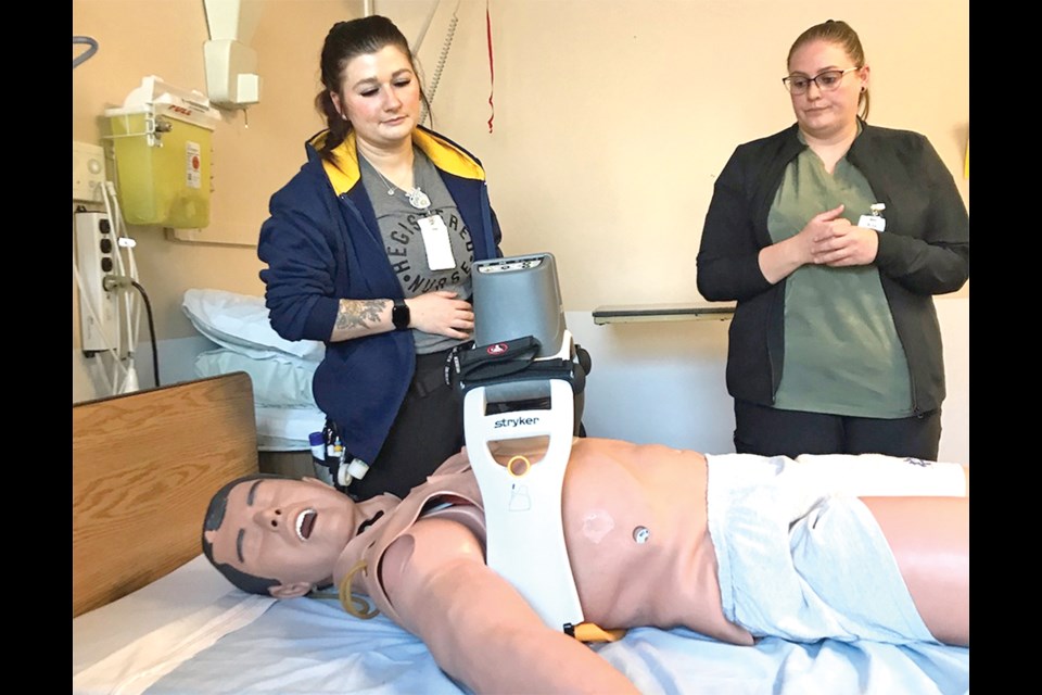 Aided by fundraising from the Hospital auxiliary, the Canora Hospital has acquired a Lucas chest compression system for approximately $18,000, being demonstrated here by two nurses. 