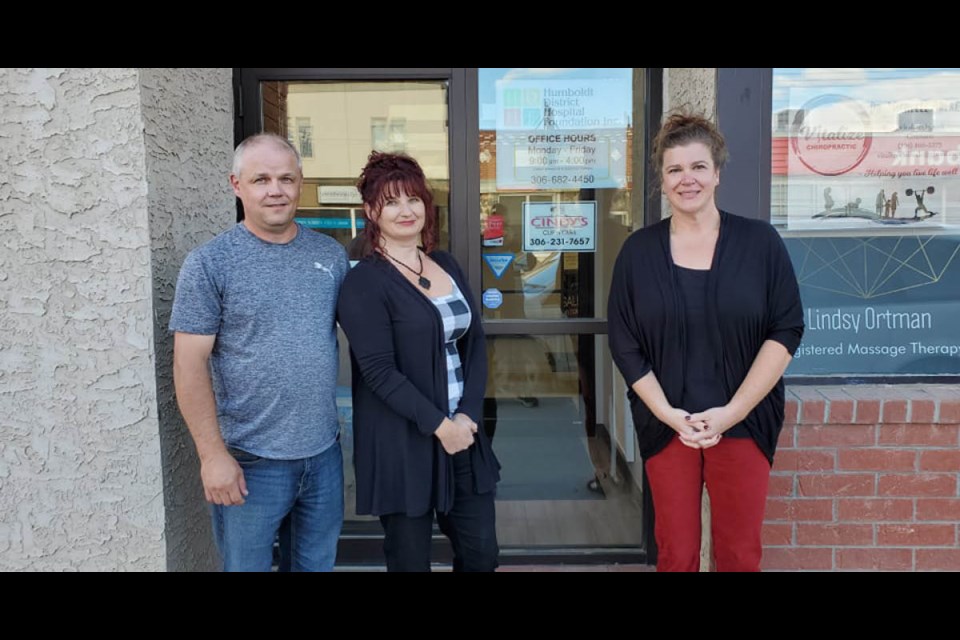 Wayne Kunz and Stacey Fowler, left, presented a $15,000 donation to the Humboldt District Hospital Foundation. To the right is Lorrie Bunko, the foundation’s executive director.