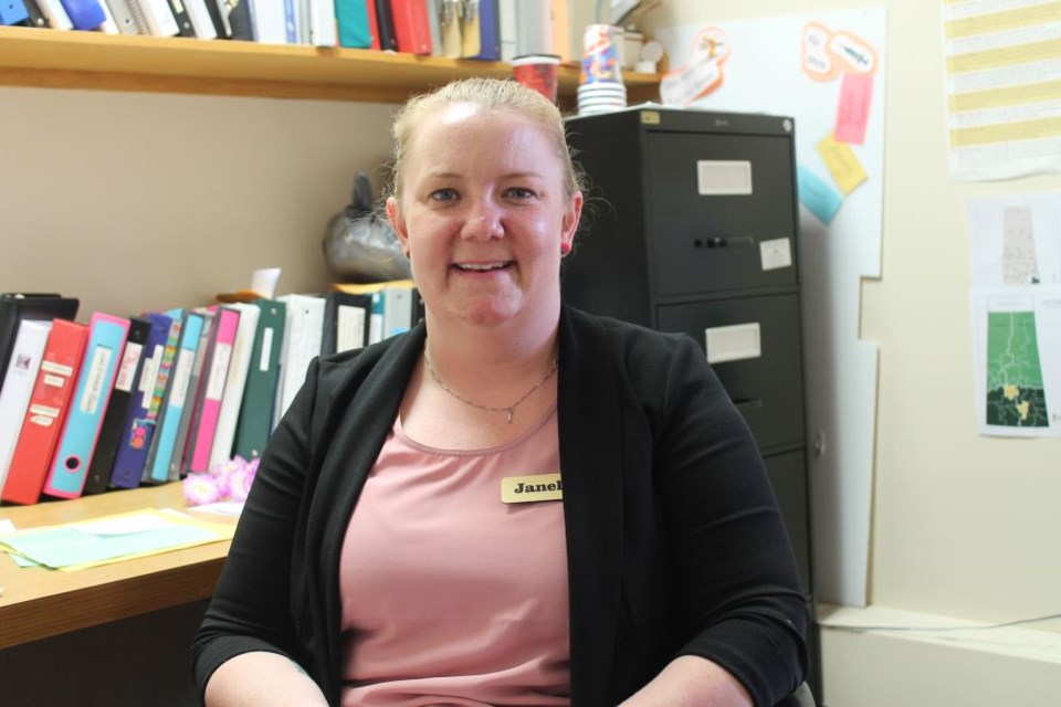  Janelle Farnden at her desk, working on making life at Sunset Haven even better.