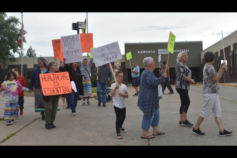 An estimated 300 people demonstrated against the closure of the Kamsack Hospital July 14 when Everett Hindley, Minister of Rural and Remote Health and Terry Dennis, Canora-Pelly MLA, met with community members and toured the facility.