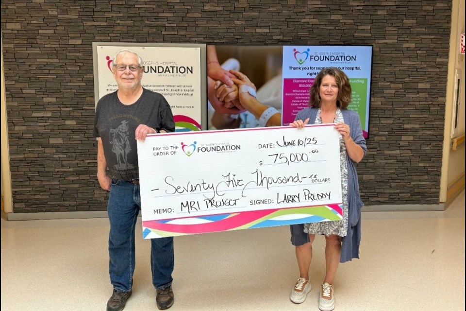 Larry Preddy presented a cheque for $75,000 to foundation executive director Lori Gervais. 