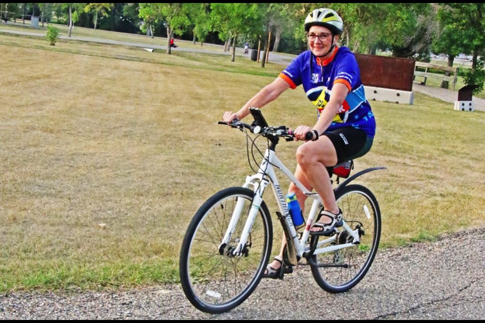 Weyburn resident Mary Shirkie is shown riding her bike on the Tatagwa Parkway path near River Park on Aug. 8, as she is actively riding as part of the 'Great Cycle Challenge' to raise funds for cancer research.