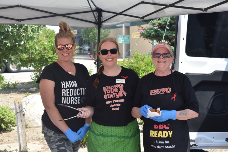 Among the organizers for the National HIV Testing Day barbecue in Kamsack, from left, were: Shana Moroz, Kamsack public health nurse; Candice Nelson, Positive Impact Social Worker, and Gerry Sage, HIV Peer Mentor.