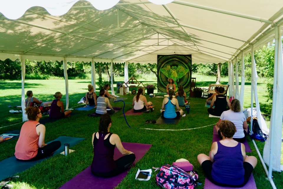 The Harmony in Nature outdoors class was led by Marissa Friess of OM Yoga Studio.                              