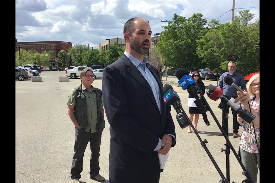 Miguel Morrissette from SaskBuilds addresses reporters regarding a site assessment to happen at the Regina General Hospital parking lot.