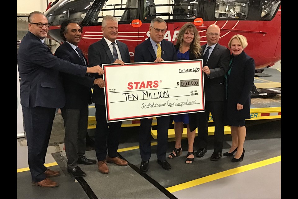 A $10 million cheque is presented to STARS Air Ambulance by the province’s Crown corporations.