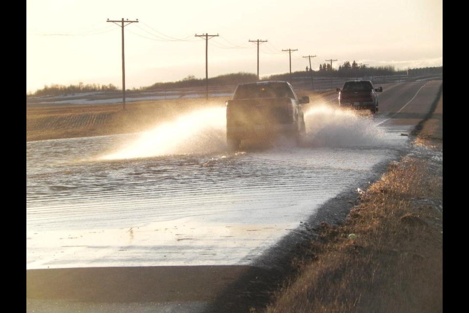 Travellers may not have expected water on the roadway April 27, 2013 that resulted from spring flooding from a winter full of heavy snow.