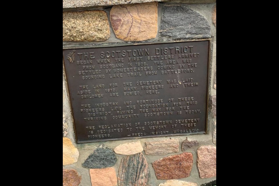 A sign at the entrance of Scotstown Cemetery in a rural area outside of Unity outlines some of its history.