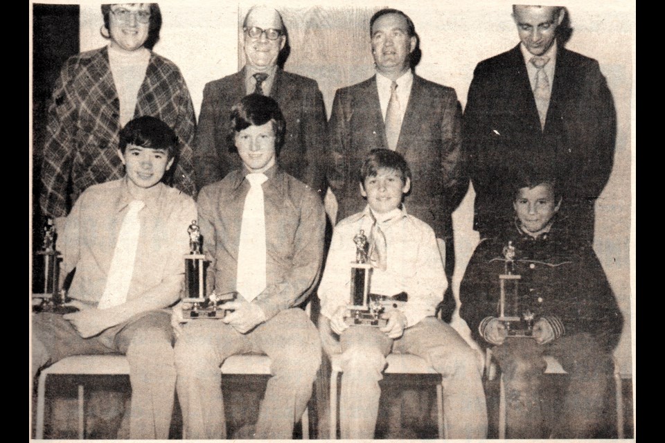50 years ago hockey MVP awards were received by Warren Frerichs (accepted on his behalf by Gaston Gordeau), Morley Scott, Randy Sander and Michael Leier, seated. Presenting the awards were Stan Kolojay, George Lane, Jim Ridley and Ed Duchscher, standing
