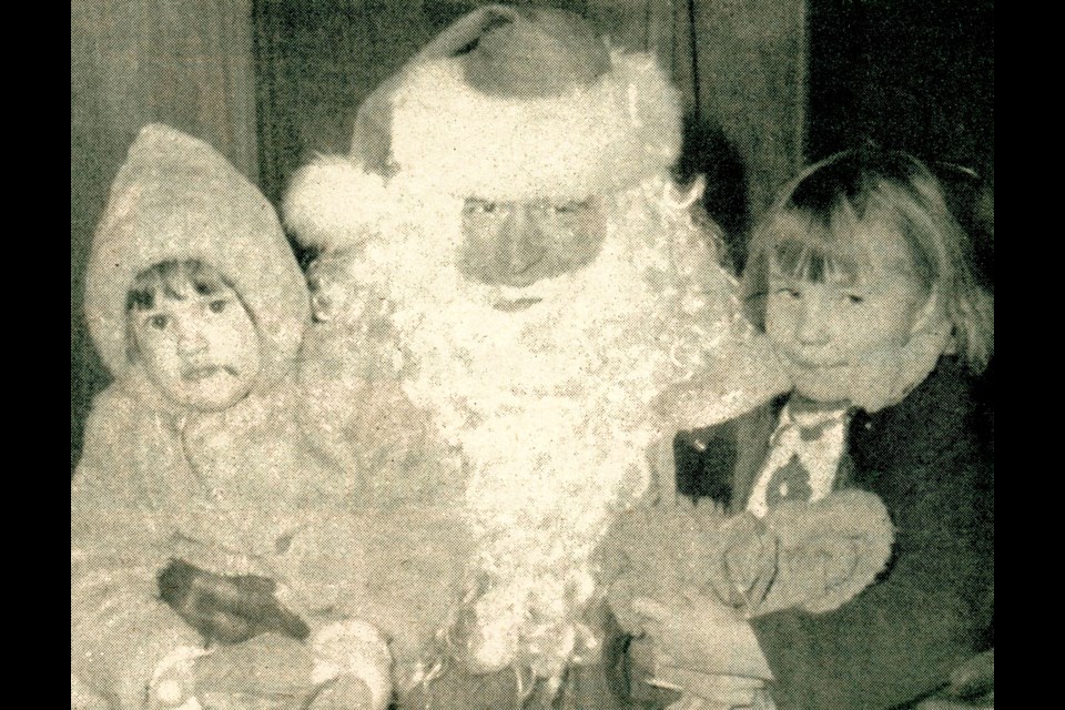 These are just two of the some 800 children who got in a visit with Santa at the Star Theatre on “Santa Day” in 1972, sponsored by the Unity and District Chamber of Commerce.