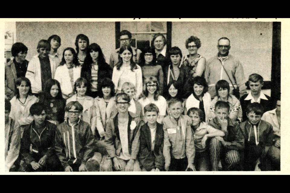 Twenty-nine Grade 7 students from Denzil School and their four chaperones – Richard McEachern, principal; social studies teacher Calvin Bachneeer and parents Joe Volk and Helen Volk – pose for a group photo before boarding a train bound for Ontario where they would tour Ottawa, Kingston, Welland, Niagara and Toronto, in June of 1972.