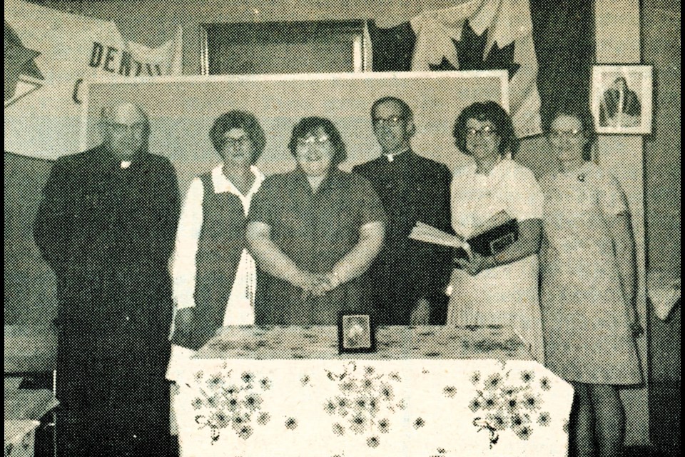 Denzil CWL is visited by Diocesan officers in 1972.  L-R are Rev. Father B. Lewans, Mrs. Helen Volk, Miss Angela Vetter, Rev. Father Senger (Diocesan director), Mrs. Florence Palmer (Diocesan president), and Mrs. Katy Kletz.