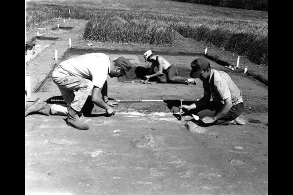 Dean Clark, Dave Meyer and Don Welsh, working in the background on a dig at Fort Riviere Tremblante near Kamsack.  
-Photo Courtesy University of Saskatchewan Archives - Photograph Collection, 1967
