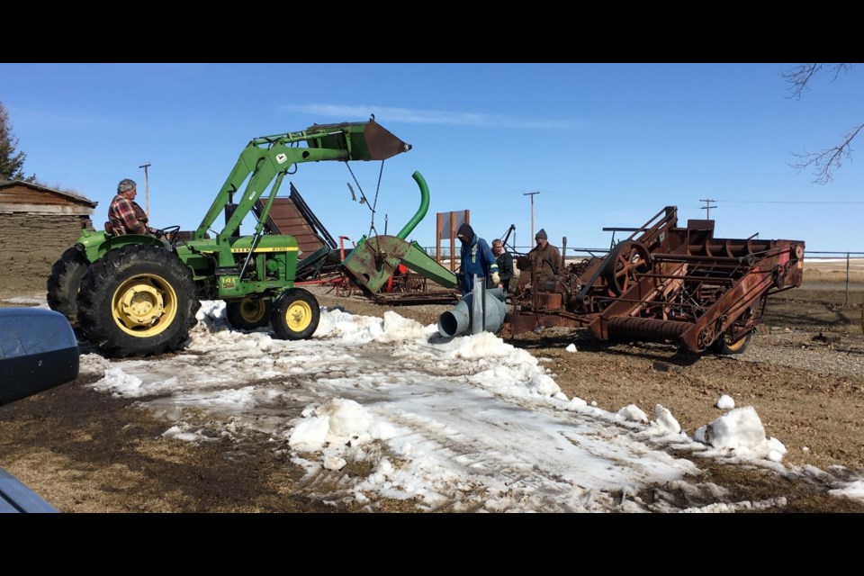 Museum committee and volunteers worked collaboratively to moving machinery row to accommodate a Highway 21 construction project.