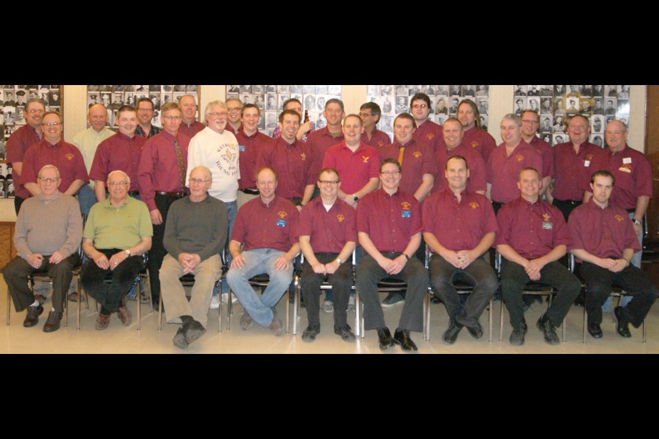 Past and present Weyburn Young Fellows members in the club’s 90th year.
Photo taken March 2012.