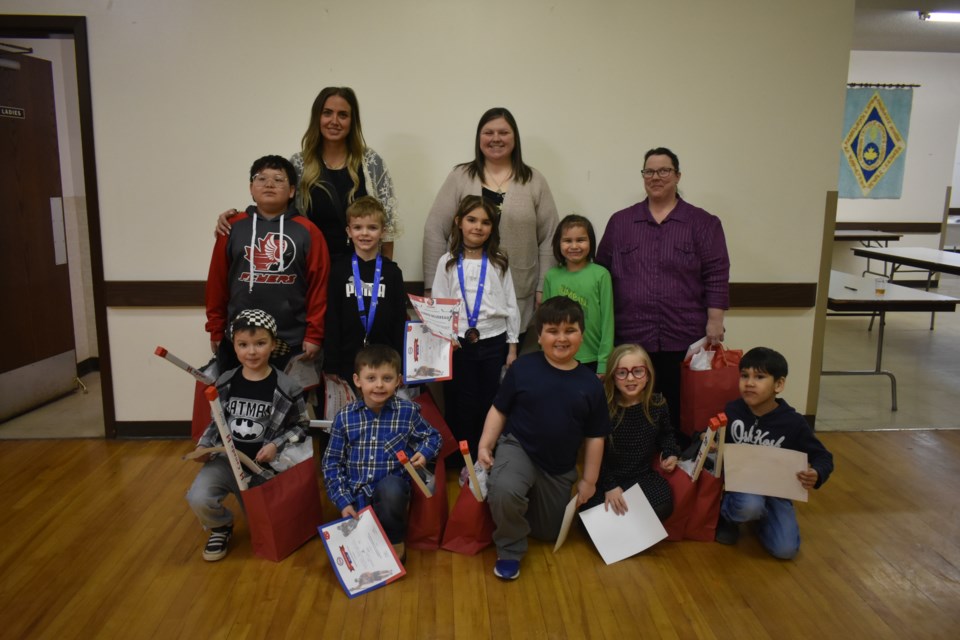 Players and coaches alike were recognized and applauded at the Kamsack Minor Hockey Banquet on March 21. The U7 players and their coaches, from left, were: (back row) Coach Jenna Nahnybida, Manager Michelle Guillet, and Coach Keri Lindsay; (middle) Carter Keshane, Mason Case, Aubree Boudreau, and Julez Brass; and (front), Kairo Whims, Weston Nahynybida, Asher Guillet, Dot Foster, and Jace Keshane. Award winners were: Liam Tourangeau (most improved), Aubree Boudreau (most team spirit), and Mason Case (most dedicated). Not available for photo were: Coach Dustin Wilson, Zayn Tourangeau, Liam Tourangeau, and Joey Kehler. 