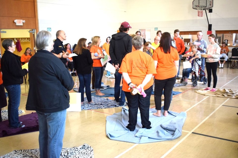 The blanket exercise at St. Paul's United Church in Estevan attracted a large crowd, as they learned more about Indigenous history.