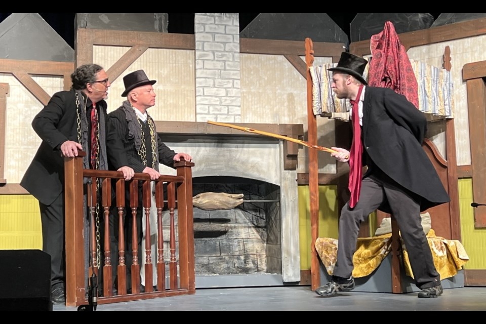 Cutline 2: From left, Grant Taylor (Jacob Marley), Shannon Klatt (Bob Marley), and Ashton Lisitza (Ebenezer Scrooge) were all part of the A Christmas Carol, Slightly Twisted. 