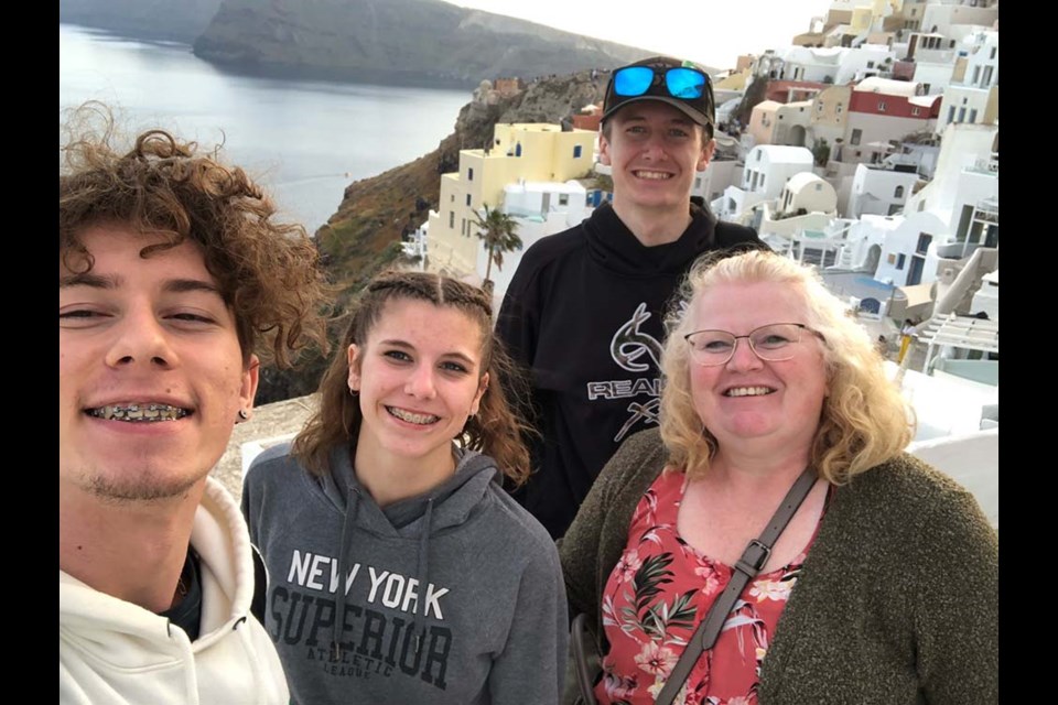 Reese Cherwinski, Alesha Moore, Justin Moore and group leader Sandra Lange at Santorini.