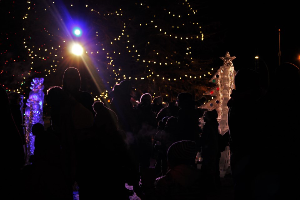 Regina residents gathered in the classic Saskatchewan cold to witness the official lighting of City Hall for the holiday season.