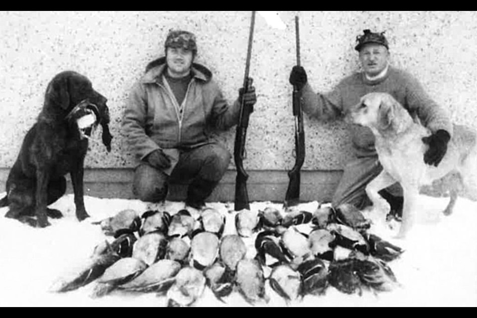 Frank (left) with dog Tiger and Frank’s father with dog Prince after a successful goose hunt in 1970.
Young Frank:  A young Frank Mann, dressed in his uniform, became “the man” when it comes to the grocery business.
