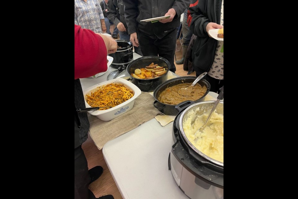 Monthly potluck suppers bring the community together during the colder months.