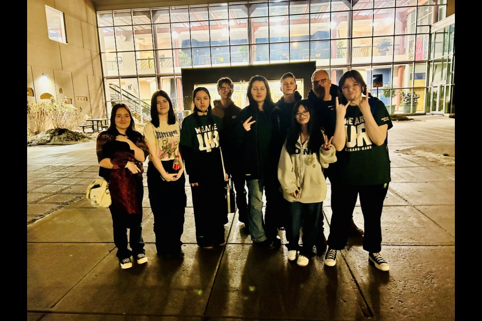 In front of the University of Regina for a photo during the Honour Band Program were the KCI band members, from left: Aliyah Cymbalisty, Lauren Talbot, Serenity Cote, Murdock Martinuik, Olivia Ivanochko of Preeceville, Kennan Kitsch, Aliyah Larracas, Darren Kitsch (director), and Kaesee Keshane.